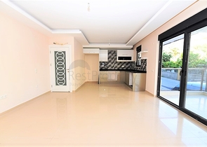 شقة جديدة للبيع في مركز الانيا _ من تصميم غرفتين وصالة 