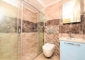 شقة جديدة للبيع في مركز الانيا _ من تصميم غرفتين وصالة 