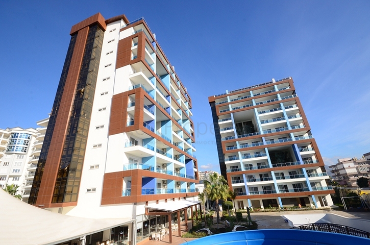 غرفة نوم وصالة ضمن مجمع سكني جانب مركز التسوق في جيكجيلي _ الانيا 