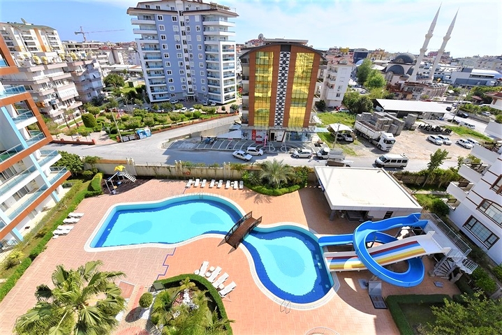 غرفة نوم وصالة ضمن مجمع سكني جانب مركز التسوق في جيكجيلي _ الانيا 