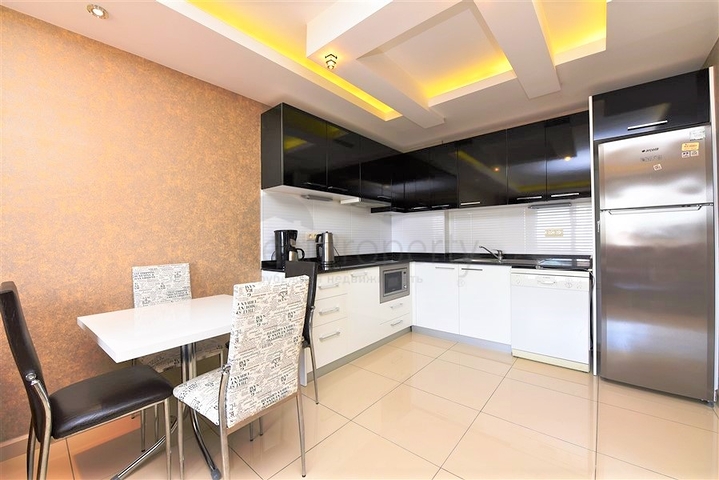 غرفة نوم وصالة ضمن مجمع سكني جانب مركز التسوق في جيكجيلي _ الانيا 