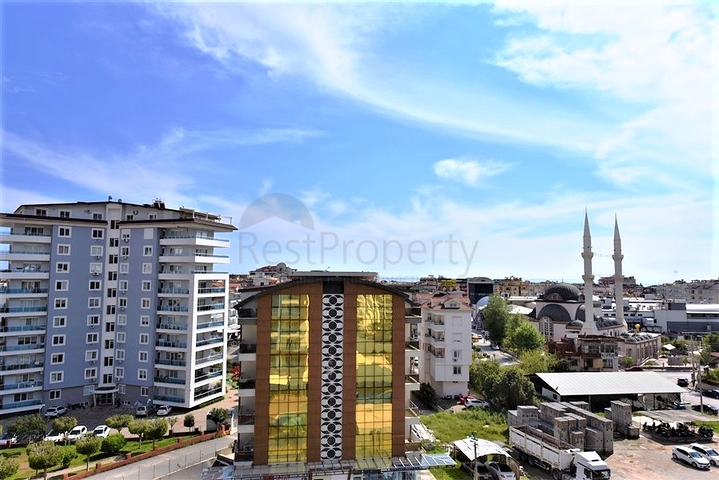 غرفة نوم وصالة ضمن مجمع سكني جانب مركز التسوق في جيكجيلي _ الانيا 