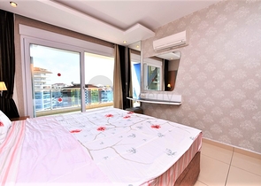 غرفة نوم وصالة ضمن مجمع سكني جانب مركز التسوق في جيكجيلي _ الانيا 