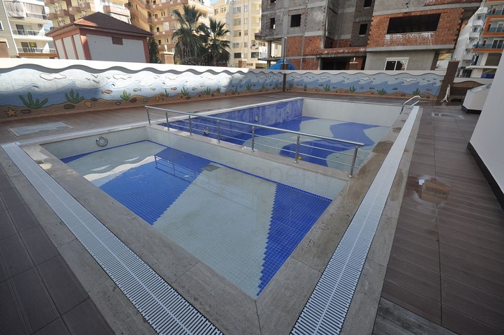 شقة قريبة من البحر - تصميم غرفتين وصالة ضمن مجمع سكني جديد في مهموتلار / الانيا 