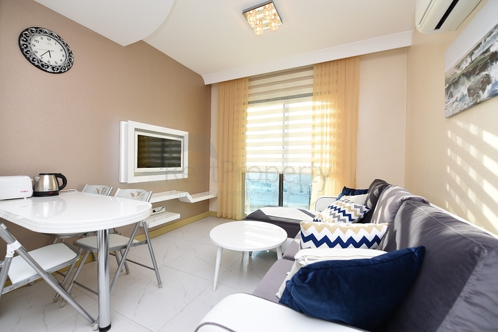 مركز الانيا - غرفة نوم وصالة مفروشة ضمن مجمع سكني 