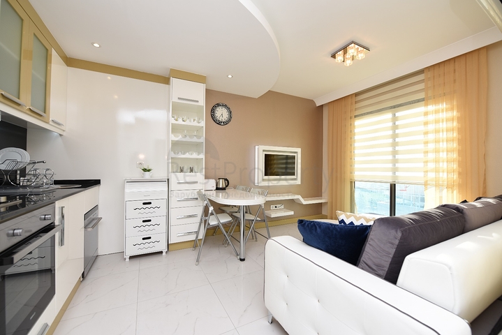 مركز الانيا - غرفة نوم وصالة مفروشة ضمن مجمع سكني 