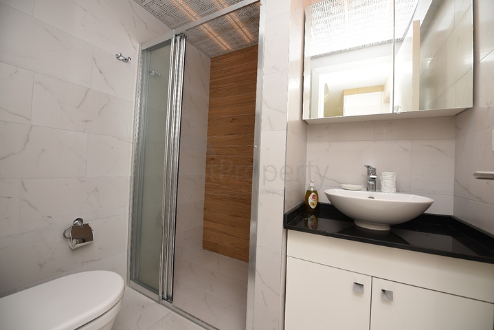 مركز الانيا - غرفة نوم وصالة مفروشة ضمن مجمع سكني 