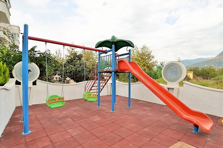 شقة للبيع في الانيا - من تصميم غرفة نوم وصالة ضمن مجمع سكني في مهموتلار 