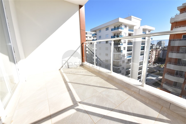 شقة للبيع في الانيا - من تصميم غرفة نوم وصالة ضمن مجمع سكني في مهموتلار 