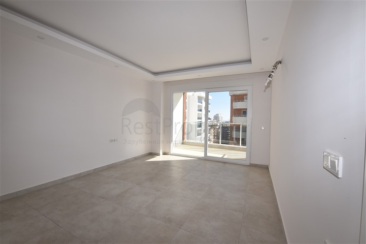 شقة للبيع في الانيا - من تصميم غرفة نوم وصالة ضمن مجمع سكني في مهموتلار 