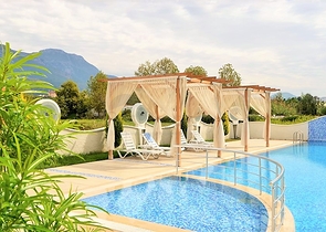 شقة للبيع في الانيا - من تصميم غرفة نوم وصالة ضمن مجمع سكني في مهموتلار 