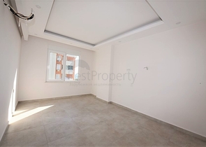 شقة للبيع في الانيا - من تصميم غرفة نوم وصالة ضمن مجمع سكني في مهموتلار 