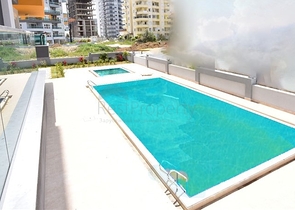 شقة من تصميم غرفتين وصالة - مفروشة - ضمن مجمع سكني حديث في مهموتلار - الانيا