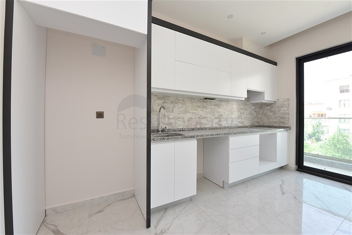 شقة غرفتين وصالة ومطبخ منفصل -ضمن مجمع سكني حديث في مركز الانيا 