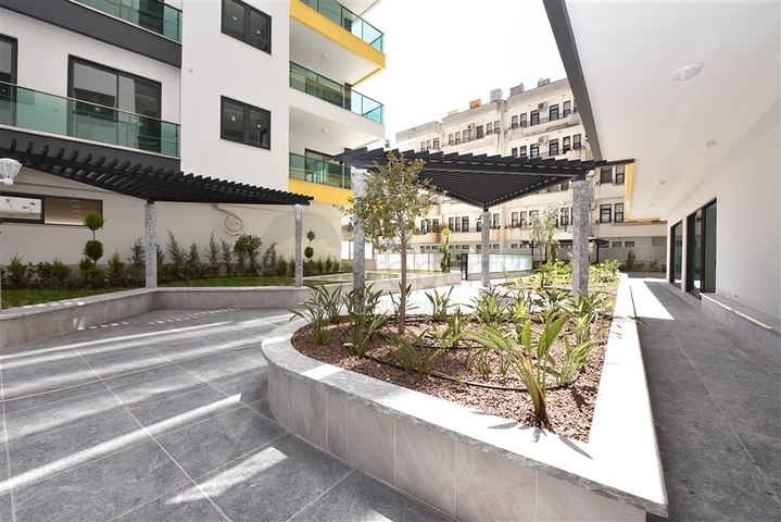 شقة غرفتين وصالة ومطبخ منفصل -ضمن مجمع سكني حديث في مركز الانيا 