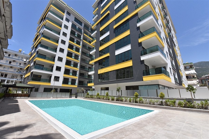 شقة غرفتين وصالة ومطبخ منفصل -ضمن مجمع سكني حديث في مركز الانيا 