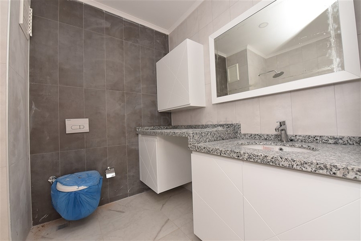 شقة غرفتين وصالة ومطبخ منفصل -ضمن مجمع سكني حديث في مركز الانيا 