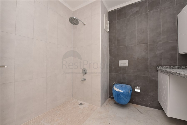 شقة غرفتين وصالة ومطبخ منفصل -ضمن مجمع سكني حديث في مركز الانيا 