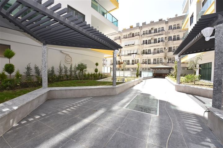 شقة غرفتين وصالة ومطبخ منفصل -ضمن مجمع سكني حديث في مركز الانيا 