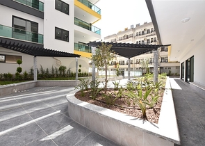 شقة غرفتين وصالة ومطبخ منفصل -ضمن مجمع سكني حديث في مركز الانيا 