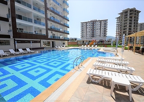 شقة غرفة وصالة ضمن مجمع ذو بنية تحتية مميزة في مهموتلار- الانيا