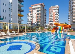 شقة غرفة وصالة ضمن مجمع ذو بنية تحتية مميزة في مهموتلار- الانيا