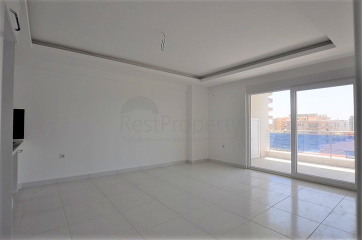 شقة بتصميم غرفة وصالة ضمن مجمع سكني حديث في مهموتلار - الانيا