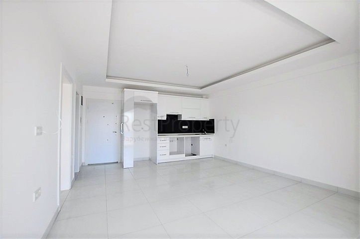 شقة بتصميم غرفة وصالة ضمن مجمع سكني حديث في مهموتلار - الانيا