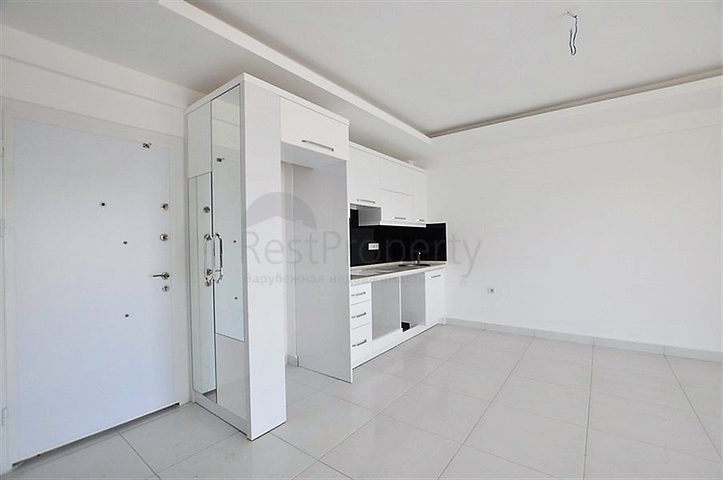 شقة بتصميم غرفة وصالة ضمن مجمع سكني حديث في مهموتلار - الانيا