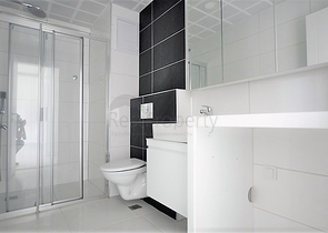 شقة بتصميم غرفة وصالة ضمن مجمع سكني حديث في مهموتلار - الانيا