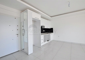 شقة بتصميم غرفة وصالة ضمن مجمع سكني حديث في مهموتلار - الانيا