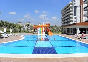 غرفتين وصالة ضمن مجمع سكني  خمس نجوم في  منطقة افسلار - الانيا 