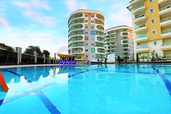 للبيع شقة بتصميم غرفتي نوم وصالة ضمن مجمع سكني في افسلار - الانيا 