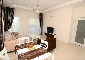 للبيع شقة بتصميم غرفتي نوم وصالة ضمن مجمع سكني في افسلار - الانيا 