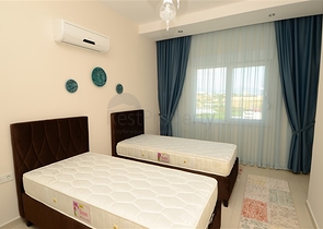 للبيع شقة بتصميم غرفتي نوم وصالة ضمن مجمع سكني في افسلار - الانيا 