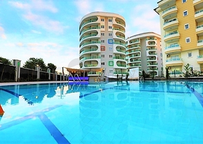 للبيع شقة بتصميم غرفتي نوم وصالة ضمن مجمع سكني في افسلار - الانيا 