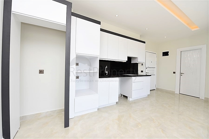 ضمن مجمع سكني حديث بأول خط على البحر - غرفة نوم وصالة في مهموتلار -الانيا 