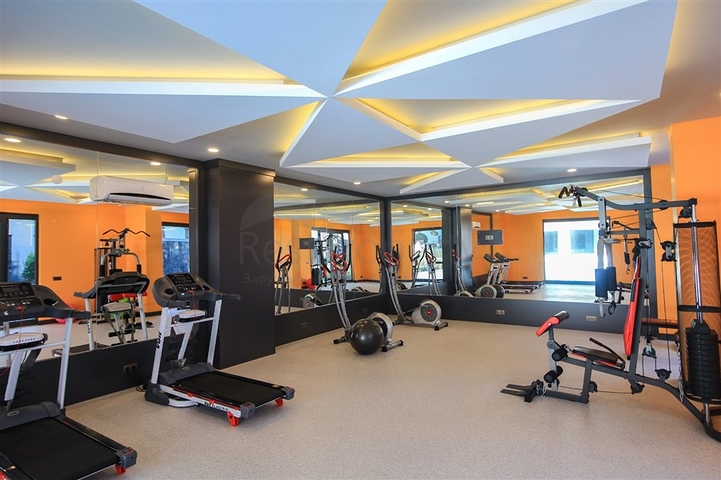 ضمن مجمع سكني حديث بأول خط على البحر - غرفة نوم وصالة في مهموتلار -الانيا 