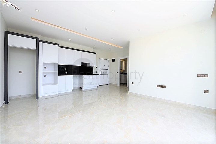 ضمن مجمع سكني حديث بأول خط على البحر - غرفة نوم وصالة في مهموتلار -الانيا 