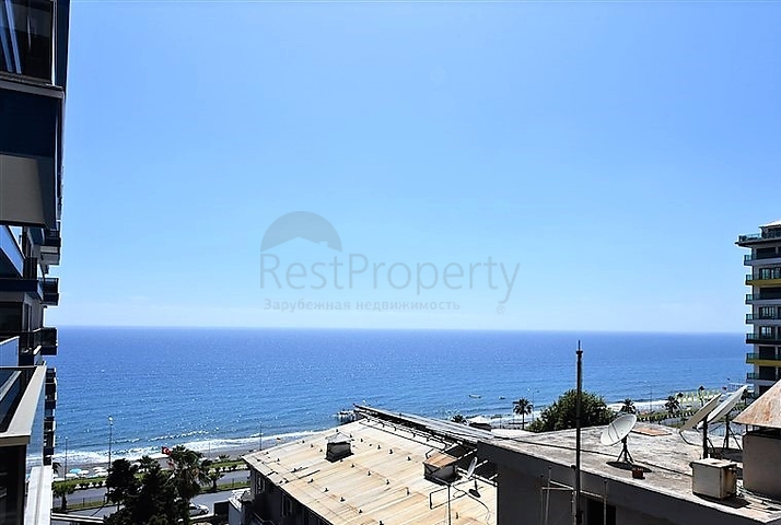 ضمن مجمع سكني حديث بأول خط على البحر - غرفة نوم وصالة في مهموتلار -الانيا 