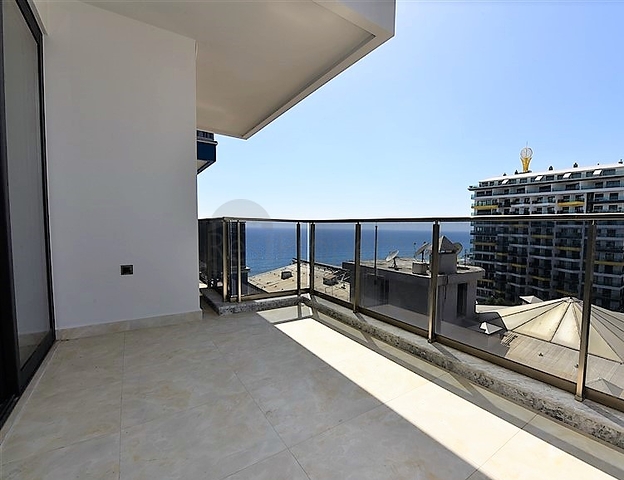 ضمن مجمع سكني حديث بأول خط على البحر - غرفة نوم وصالة في مهموتلار -الانيا 