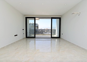 ضمن مجمع سكني حديث بأول خط على البحر - غرفة نوم وصالة في مهموتلار -الانيا 