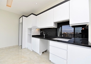 ضمن مجمع سكني حديث بأول خط على البحر - غرفة نوم وصالة في مهموتلار -الانيا 