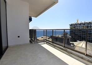 ضمن مجمع سكني حديث بأول خط على البحر - غرفة نوم وصالة في مهموتلار -الانيا 