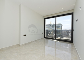 ضمن مجمع سكني حديث بأول خط على البحر - غرفة نوم وصالة في مهموتلار -الانيا 