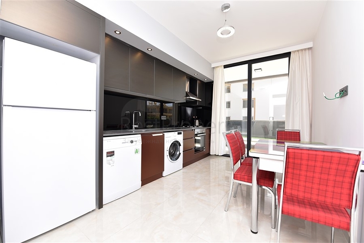 شقة بتصميم غرفتين وصالة  - ضمن مجمع حديث في مهموتلار 