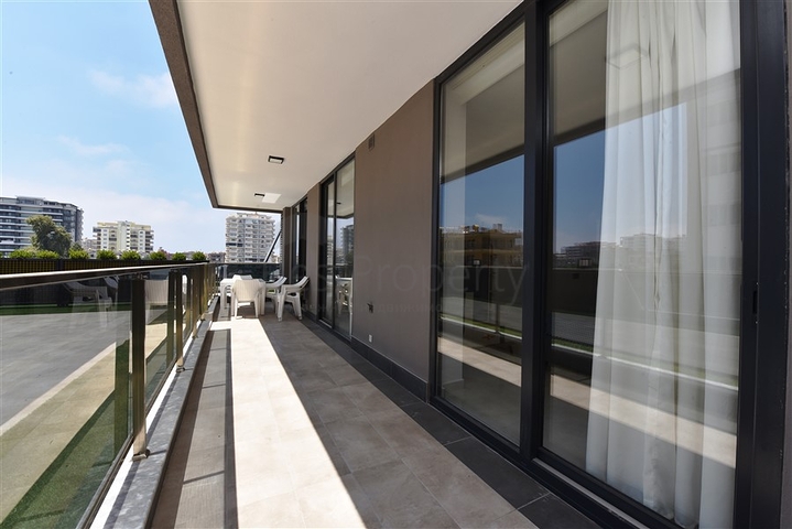 شقة بتصميم غرفتين وصالة  - ضمن مجمع حديث في مهموتلار 