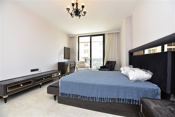 شقة بتصميم غرفتين وصالة  - ضمن مجمع حديث في مهموتلار 