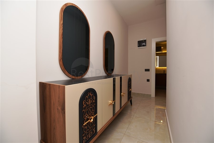 شقة بتصميم غرفتين وصالة  - ضمن مجمع حديث في مهموتلار 