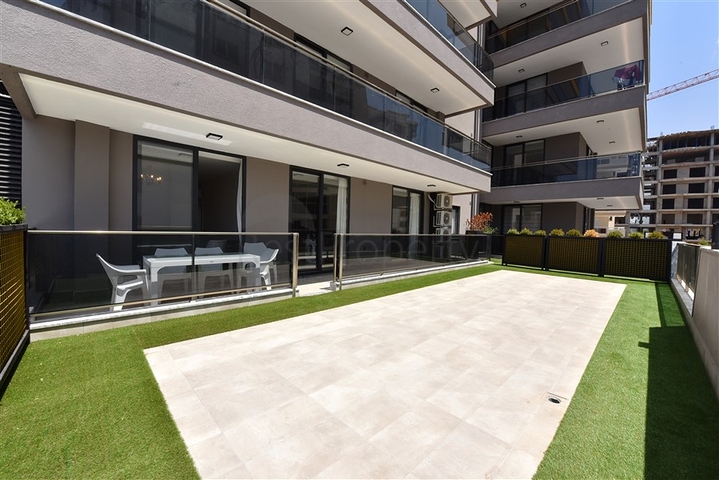 شقة بتصميم غرفتين وصالة  - ضمن مجمع حديث في مهموتلار 